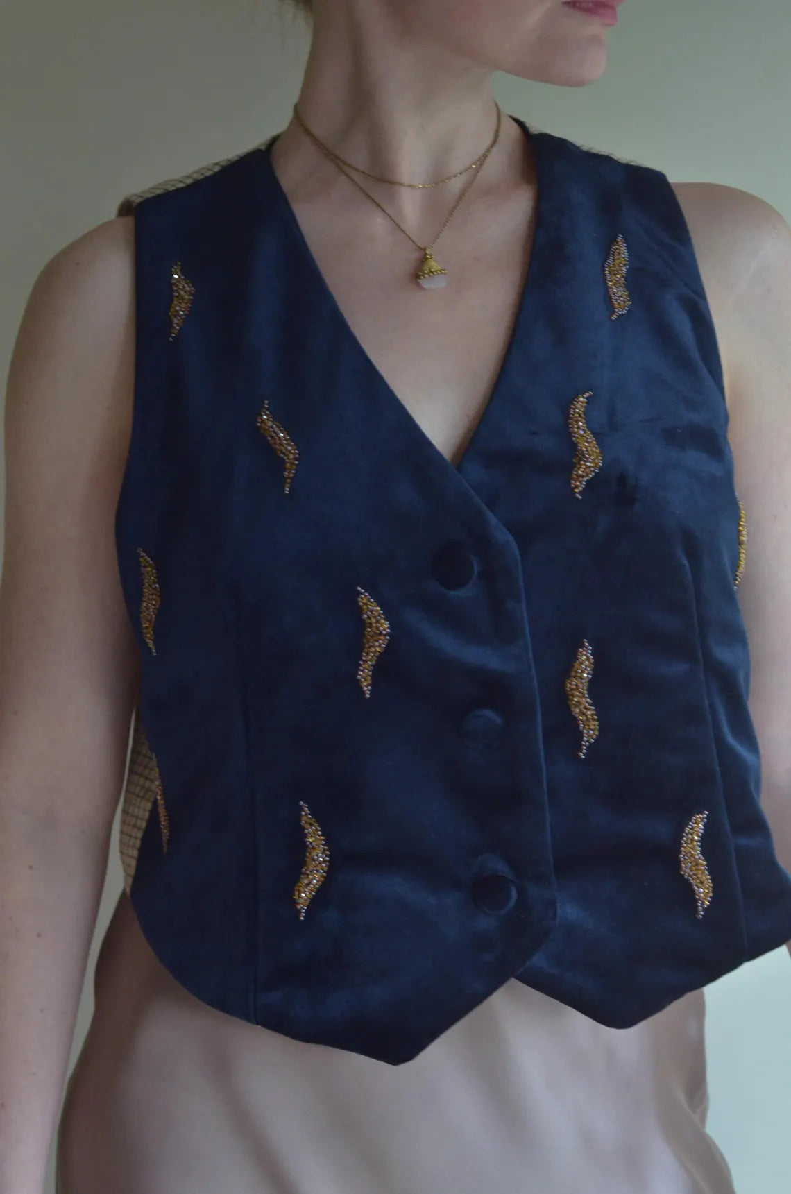 Velvet vest with bead embroidery
