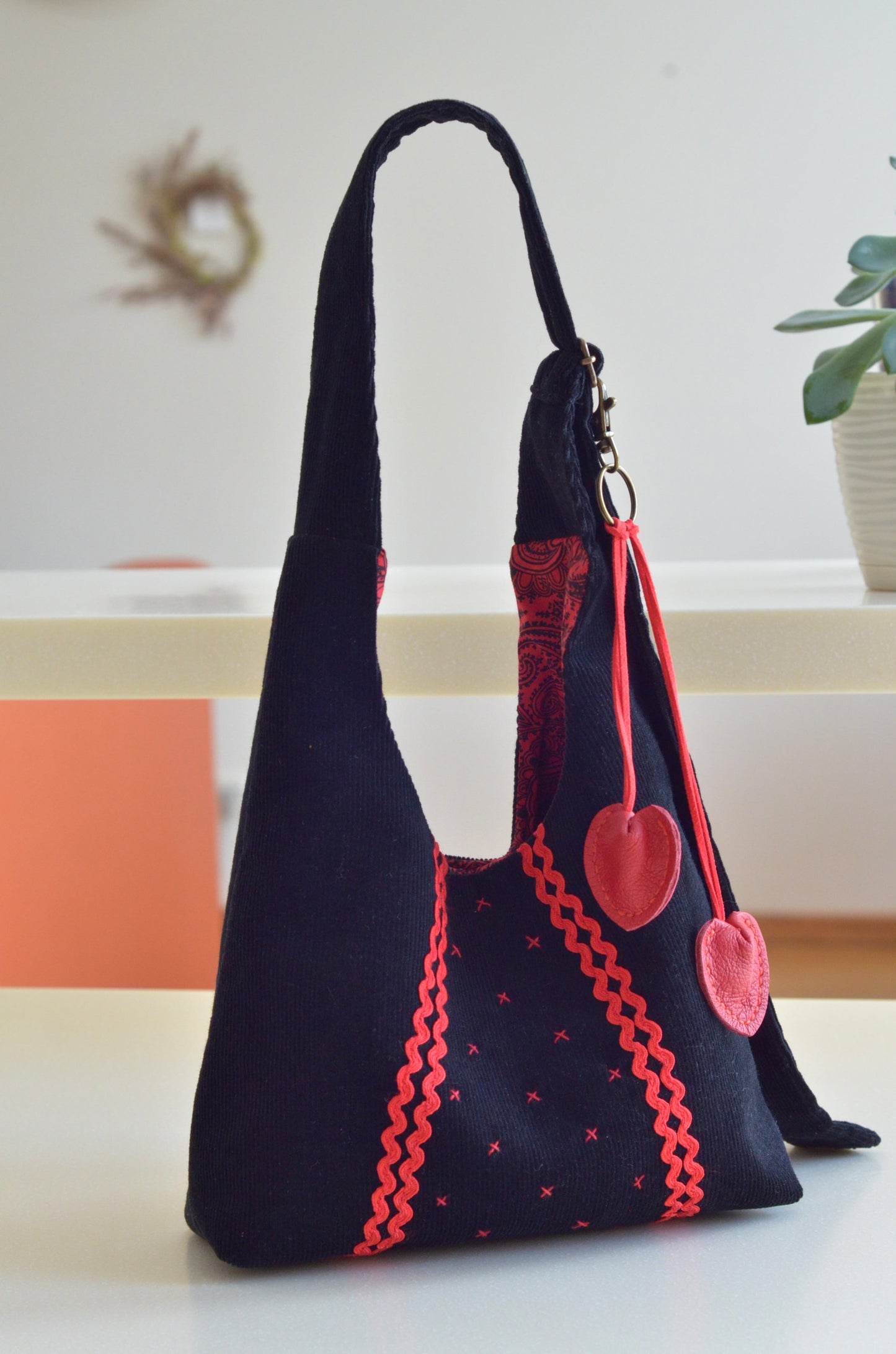 Black Purse with Red Hearts